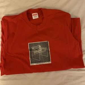 red supreme shirt